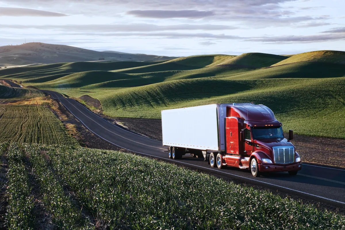 Truck driving on a road.